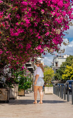 Women by beautiful flowers in the Dominican Republic zona colonial 
