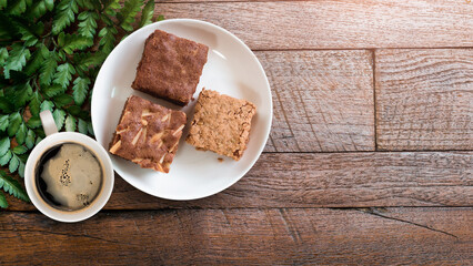 Diet set, a plate of brownies with a cup of black coffee