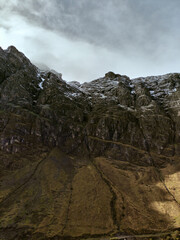 Massive mountain range on cloudy day