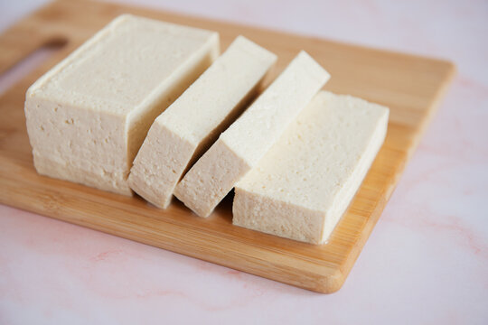 Sliced tofu on a cutting board