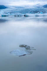 Beautiful Aerial view of the massive Glacier in Iceland and its lagoon caused by global warming -Svinafellsjokull - Jökulsárlón