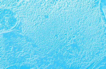 Obraz na płótnie Canvas The surface of the water. An image of a drop of oil on water. Background for the design.