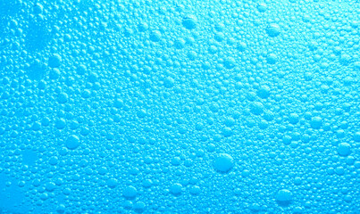 The surface of the water. An image of a drop of oil on water. Background for the design.