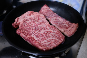 Beef sirloin grilled on a frying pan