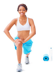 Stretching those muscles. Young african american woman stretching against a white background.