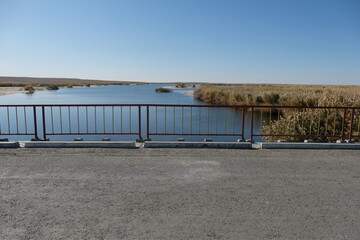 Fence along the bridge over the territory of the Aral Sea