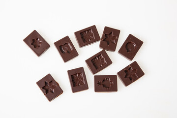 black fine chocolate pralines candies in flat top view