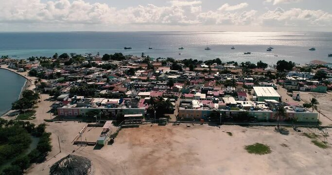 Dolly in aerial view Fishing Village With Typical Houses in Gran Roque Island in the Caribbean sea. Aerial Shot Zenith cityscape