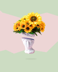 Collage with plaster antique sculpture of human face in a popart style. Creative concept ancient statue head, hair made of fresh sunflower flowers. Poster on pastel pink and mint background.