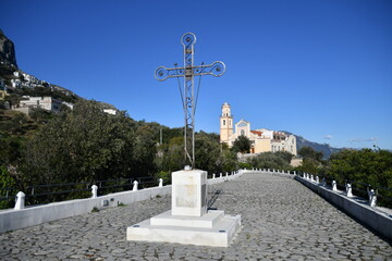 A cross on the road leading to the church of Saint Pancras in Conca dei Marini, an Italian village...