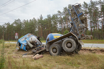 concrete mixer truck involved in a car accident and driven off the road
