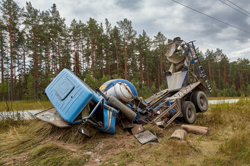 concrete mixer truck involved in a car accident and driven off the road
