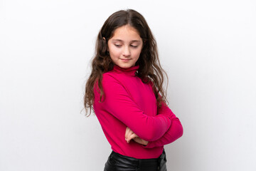 Little girl isolated on white background keeping the arms crossed