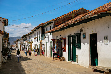Typical buildings of historic town Villa de Leyva in sunshine, Colombia
