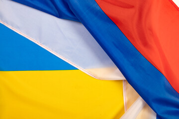 Close-up on ukrain and russian flag