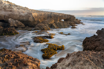 A long exposure of a wave along the coastline near Beachport South Australia on February 18th 2022