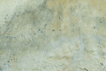 Background of old vintage grunge loft wall with cracked plaster texture.