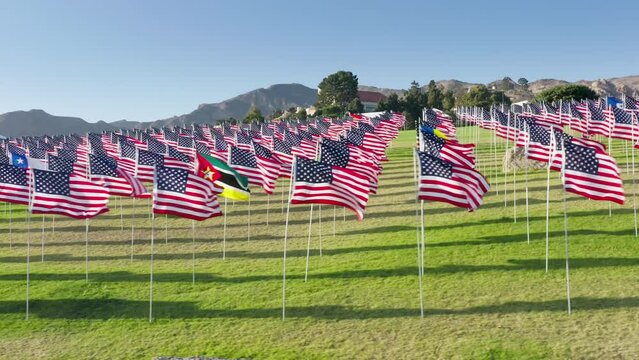 Drone footage of waving symbols in the ground at equal spaces Malibu Los Angeles