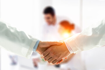 Partnership concept. Image of handshake