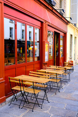 French restaurant - tables and chairs  on the street - 489336516