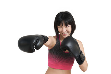 Young asian woman wearing boxing gloves punching, isolated on white background.