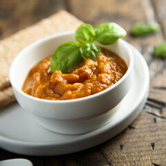 Homemade roasted vegetables dip with fresh basil