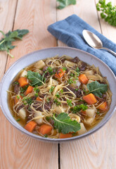Beef soup with noodles and vegetables fresh and homemade cooked