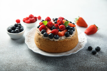 Homemade berry cake with cream filling
