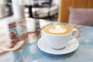 A cup of coffee at the cafe. Silence and harmony in the big city. Lifestyle. Copy space