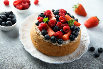 Homemade berry cake with cream filling