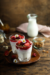 Yogurt dessert with granola and berries