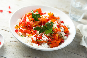 Rice with roasted bell pepper and pomegranate