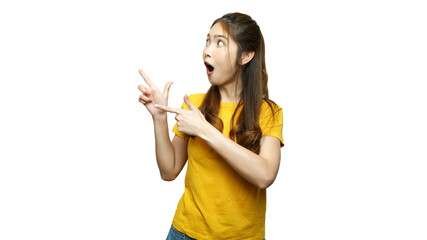 Young Asian woman on white background pointing with hands and fingers, looking to the side and camera, presenting with smile and cheerfulness.