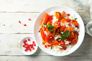Rice with roasted bell pepper and pomegranate