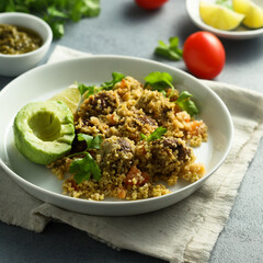 Meatballs with couscous and avocado