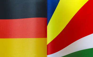 fragments of the national flags of Germany and the Seychelles close-up
