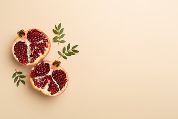 Fresh juicy pomegranate on color background, top view