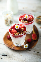 Yogurt dessert with granola and berries