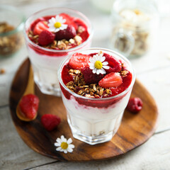 Yogurt dessert with granola and berries