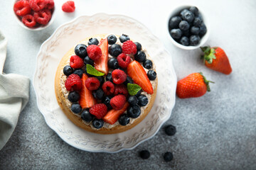 Homemade berry cake with cream filling