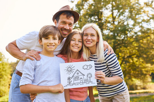 Family holds drawing for house construction and home ownership