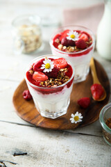 Yogurt dessert with granola and berries