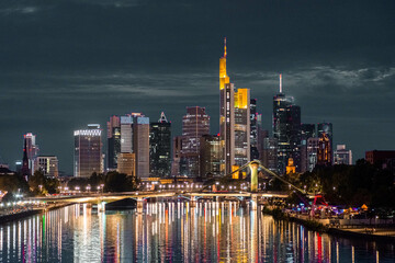 FRANKFURT, GERMANY, 25 JULY 2020 Modern cityscape of the business district with reflection on the Main river at night