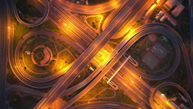 4K : Aerial time lapse in motion drone shot of freeway and interstate traffic. cars and light streaks. hyperlapse traffic
