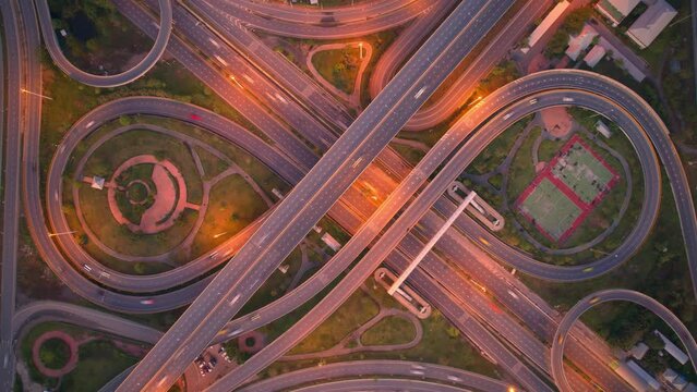 4K : Aerial time lapse in motion drone shot of freeway and interstate traffic. cars and light streaks. hyperlapse traffic
