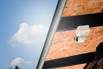 Mini cctv cameras installed on ceiling of the house to record and to do security at home when the house owner stayed outside, soft and selective focus on cctv cameras.