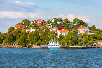 Idyllic houses on a hill by the sea