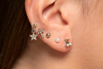 ear piercings photos.Helix piercing.Ear rings.