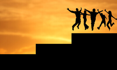 Happy Young Successful People Silhouettes  Jumping Stairs at Sunset sky. Persons Team work raised hands. Success, joy, happiness a nd business Teamwork Concept 