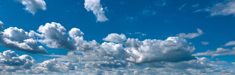 Naklejka na ściany i meble beautiful textured clouds on the blue sky 